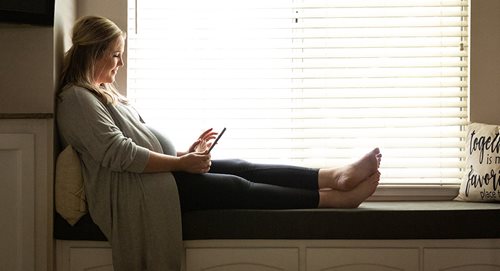 Pregnant women on phone