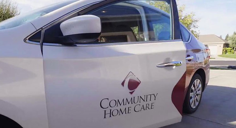 Home Care car with Community logo