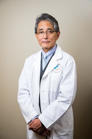 Dr. Higa