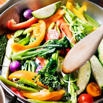 A silver pan with colorful vegetables in it